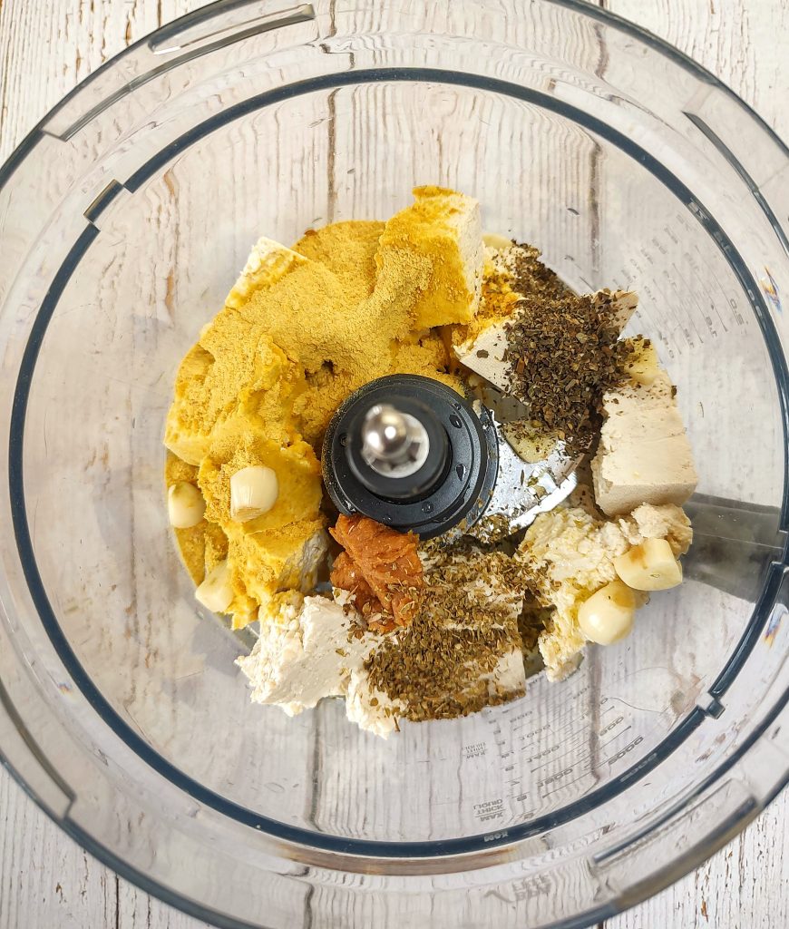 The ingredients for tofu ricotta in a bowl before being processed.